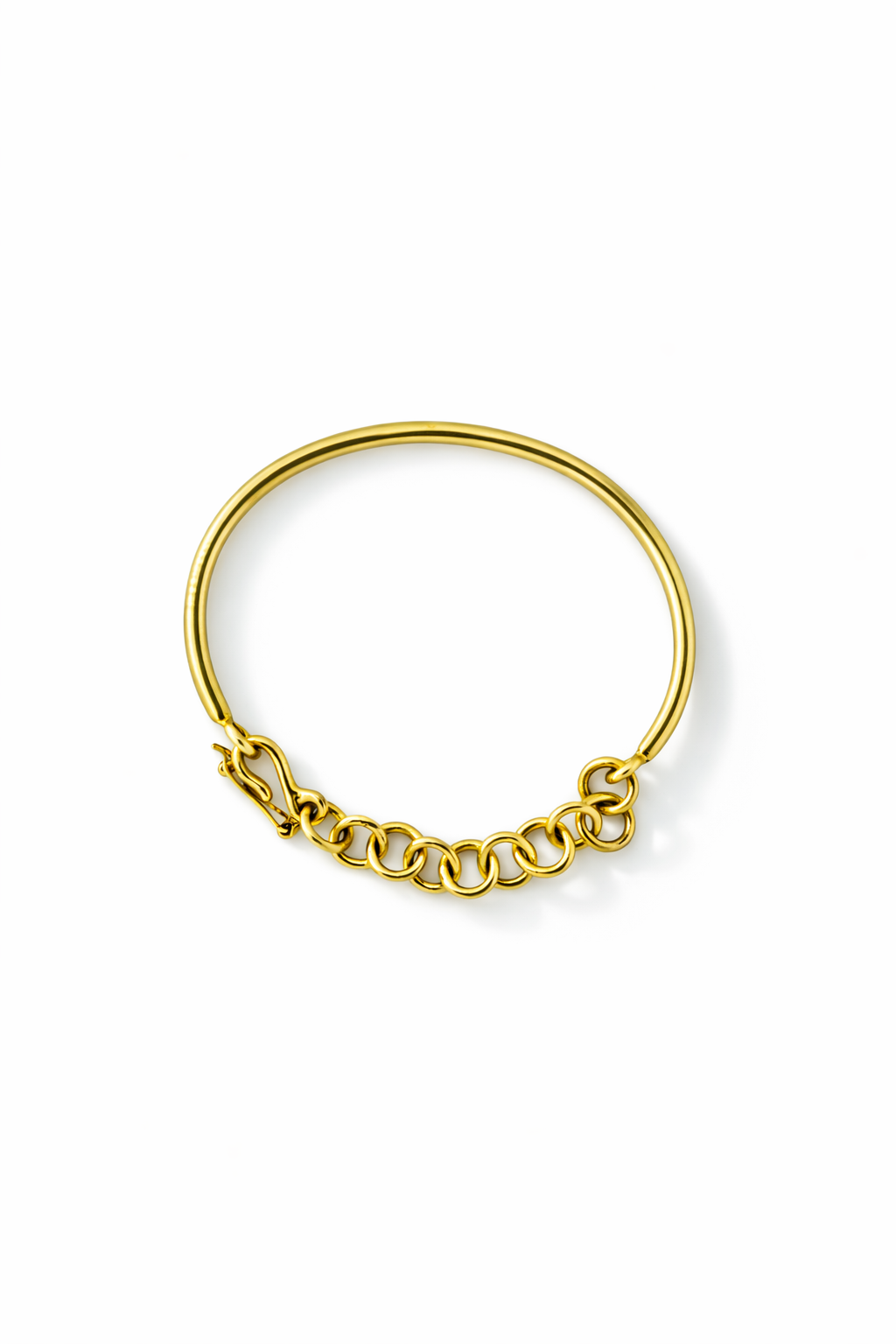 Gold bracelet on a white background